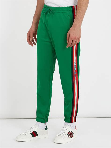 gucci track pants green and red|Gucci side stripe track pants.